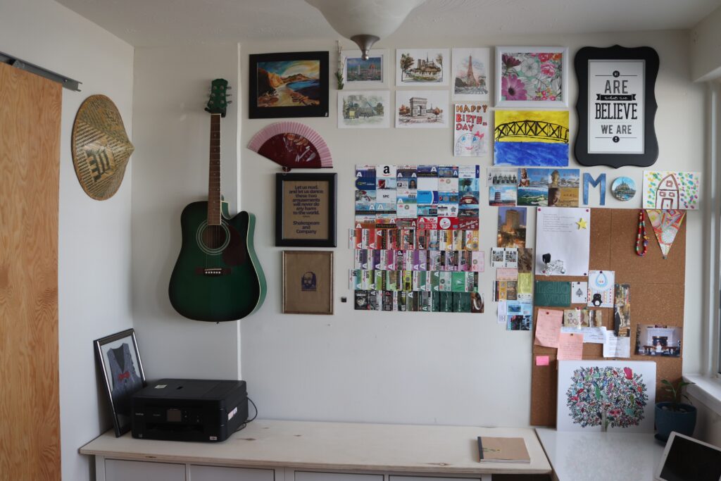 home office with wall of collage
