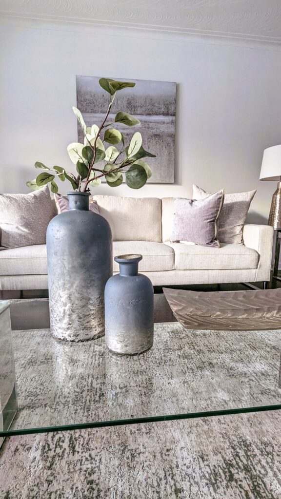 Modern living room with vases on coffee table
